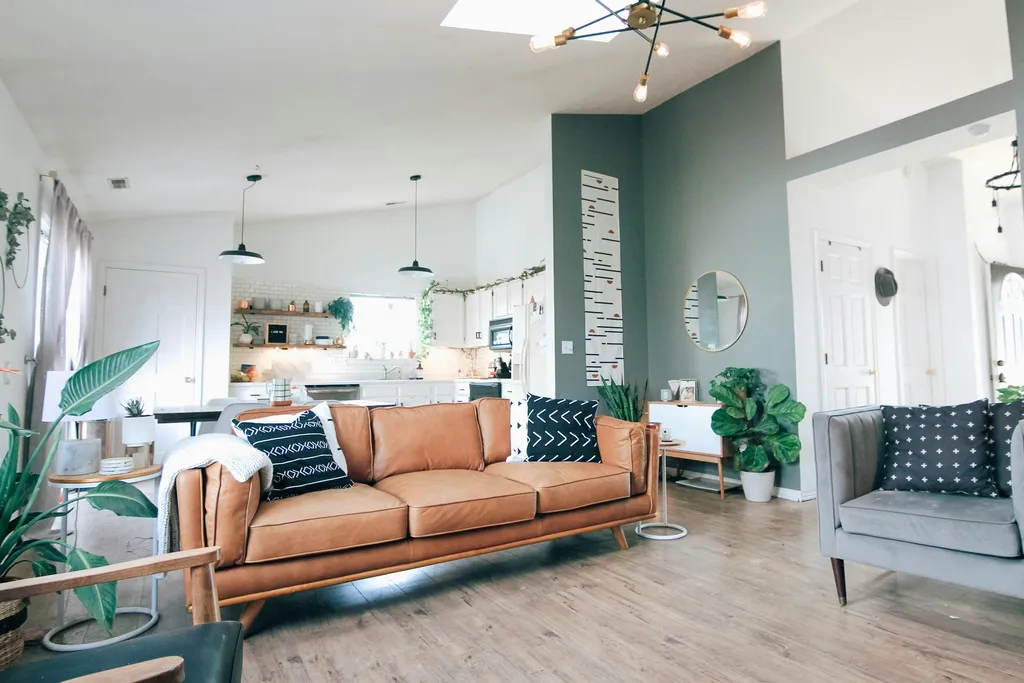 Clean comfortable living room with well-presented surfaces and light interior