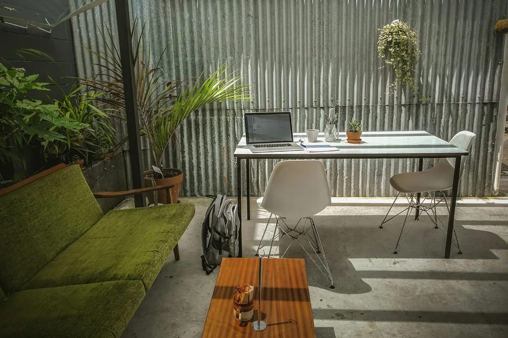 Clean modern office desk with clear surfaces and bright natural light